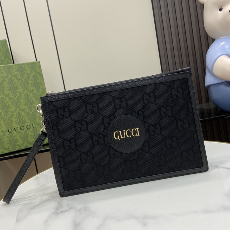 G*u*i clutch bags
